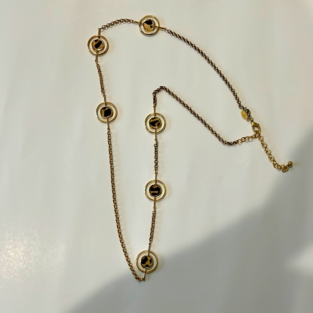 Chicos Long necklace with Leopard Inserts on circles.